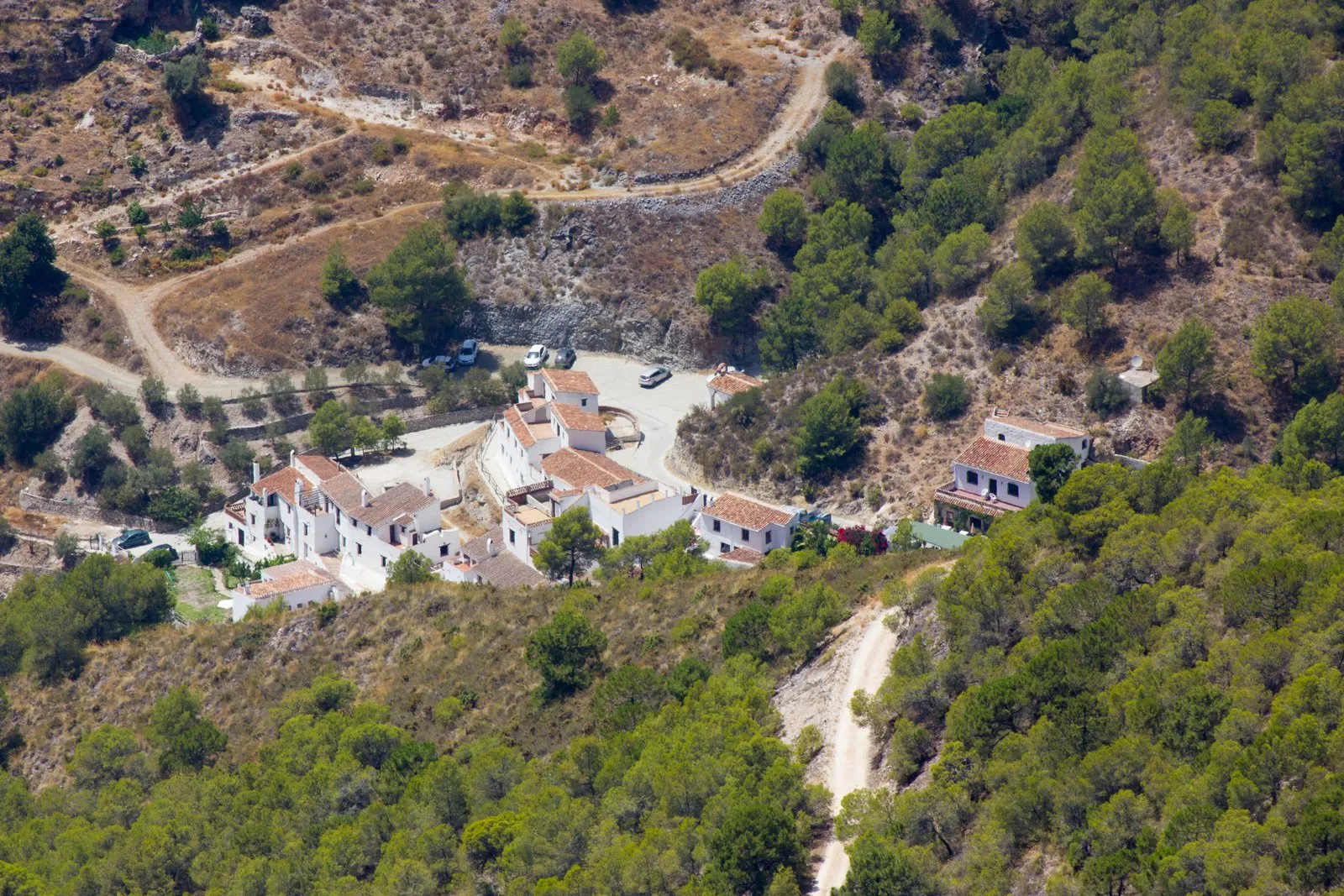 The restored hamlet of El Acebuchal nestled in the mountains above Frigiliana